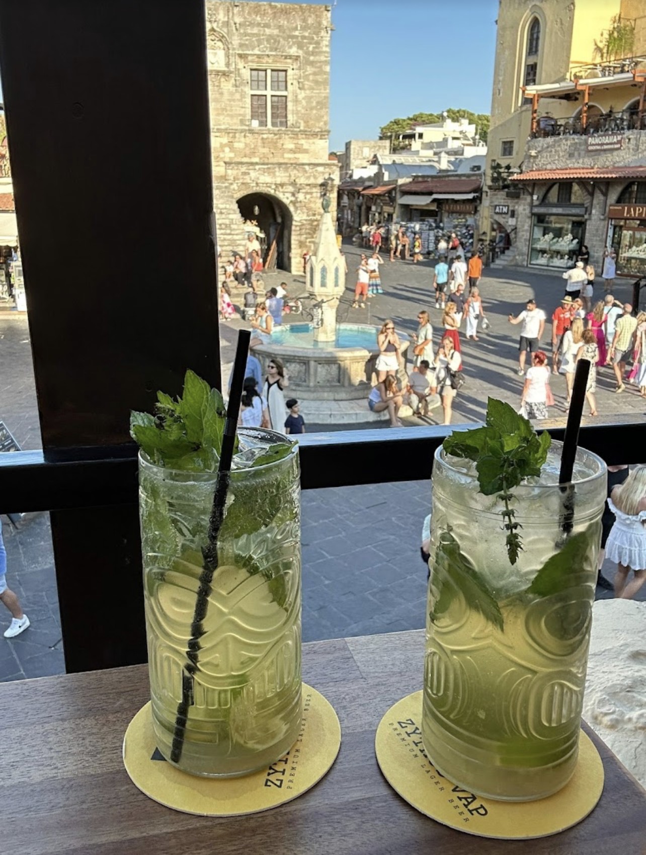 Two mojitos overlooking the fountain square