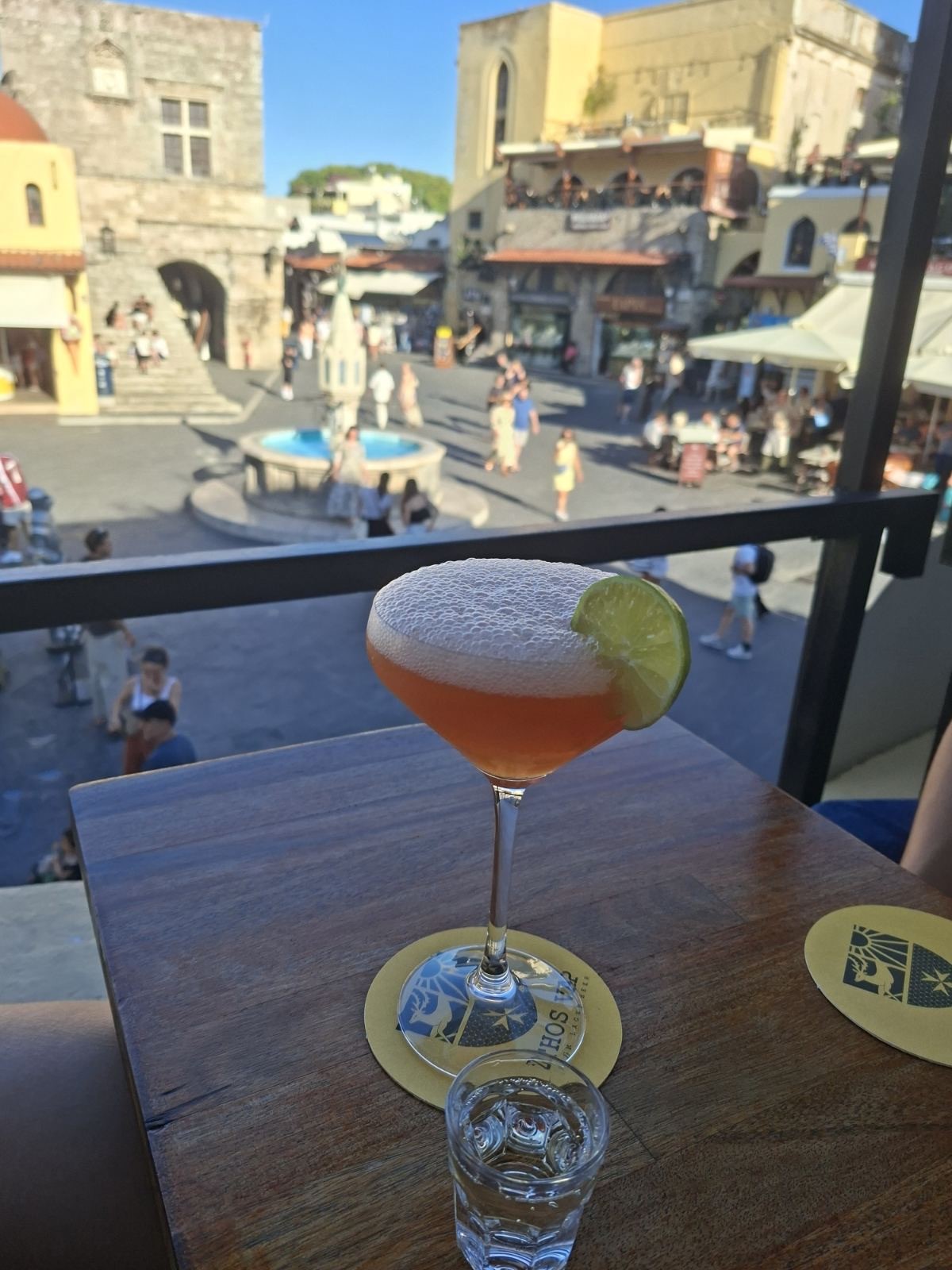 Signature coupe cocktail with lime
